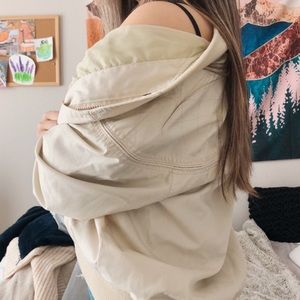 Cream colored rain jacket